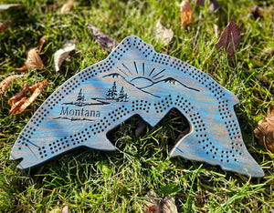 Handcrafted, CNC-carved fish-shaped hard maple cribbage board, artisan-made in Montana