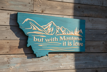 Montana shaped wood plaque with "but with Montana it is love" carved mountain scene, Made in USA