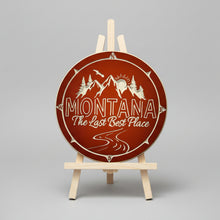 Wooden circle sign, carved, 'Montana the last best place' with mountain scene, Made in Montana USA
