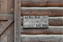 Rustic wooden sign, stained in a barnwood finish. Made in Montana cabin decor