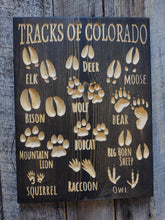 Animal Tracks of... Carved wooden sign