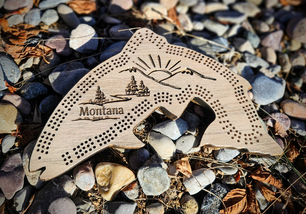 Handcrafted, CNC-carved fish-shaped hard maple cribbage board, artisan-made in Montana