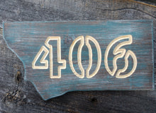 MT 406 plaque